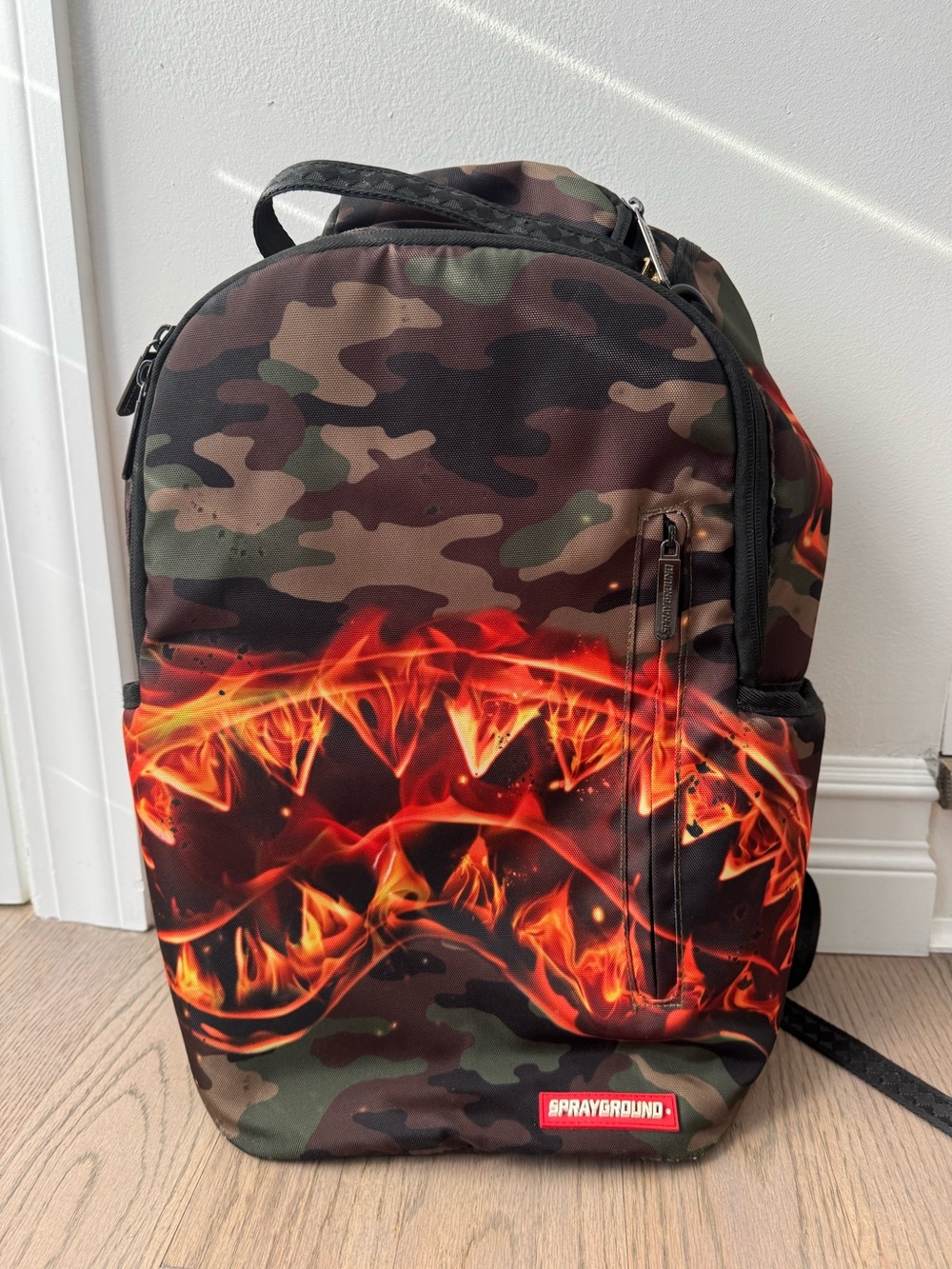 Sprayground Camo Backpack with flame effect